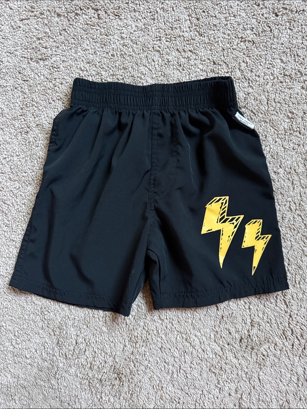 Kids Black Swim Trunks with Yellow Lightning Graphic